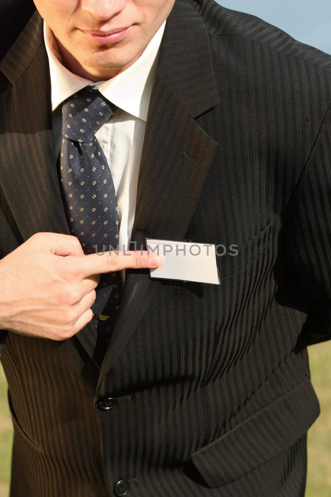 businessman pointing on empty card