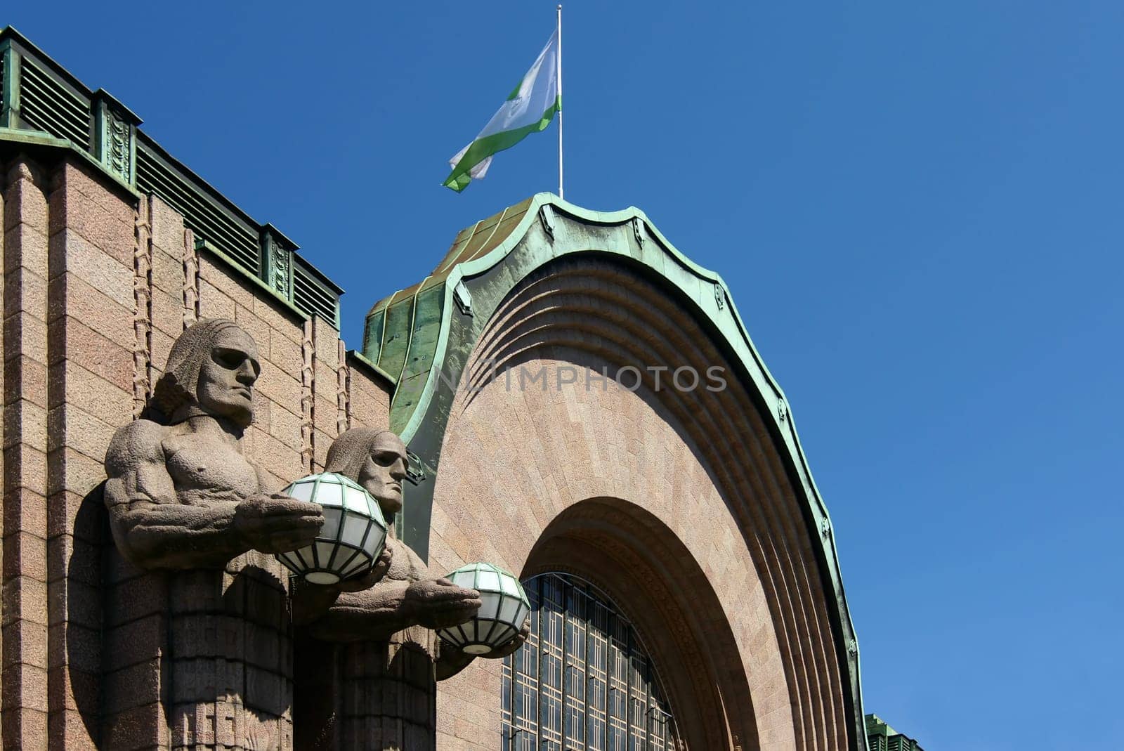 by E. Wikström at Helsinki Central Station. The station was designed by E. Saarinen and built with Finnish granite.