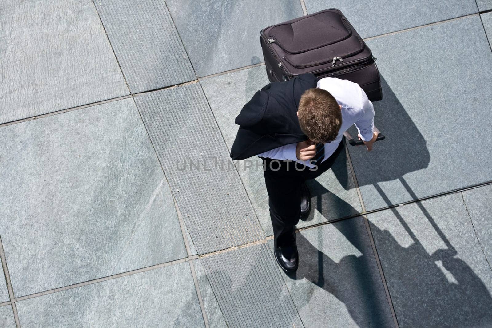 Corporate Man With Luggage And Costume Jacket