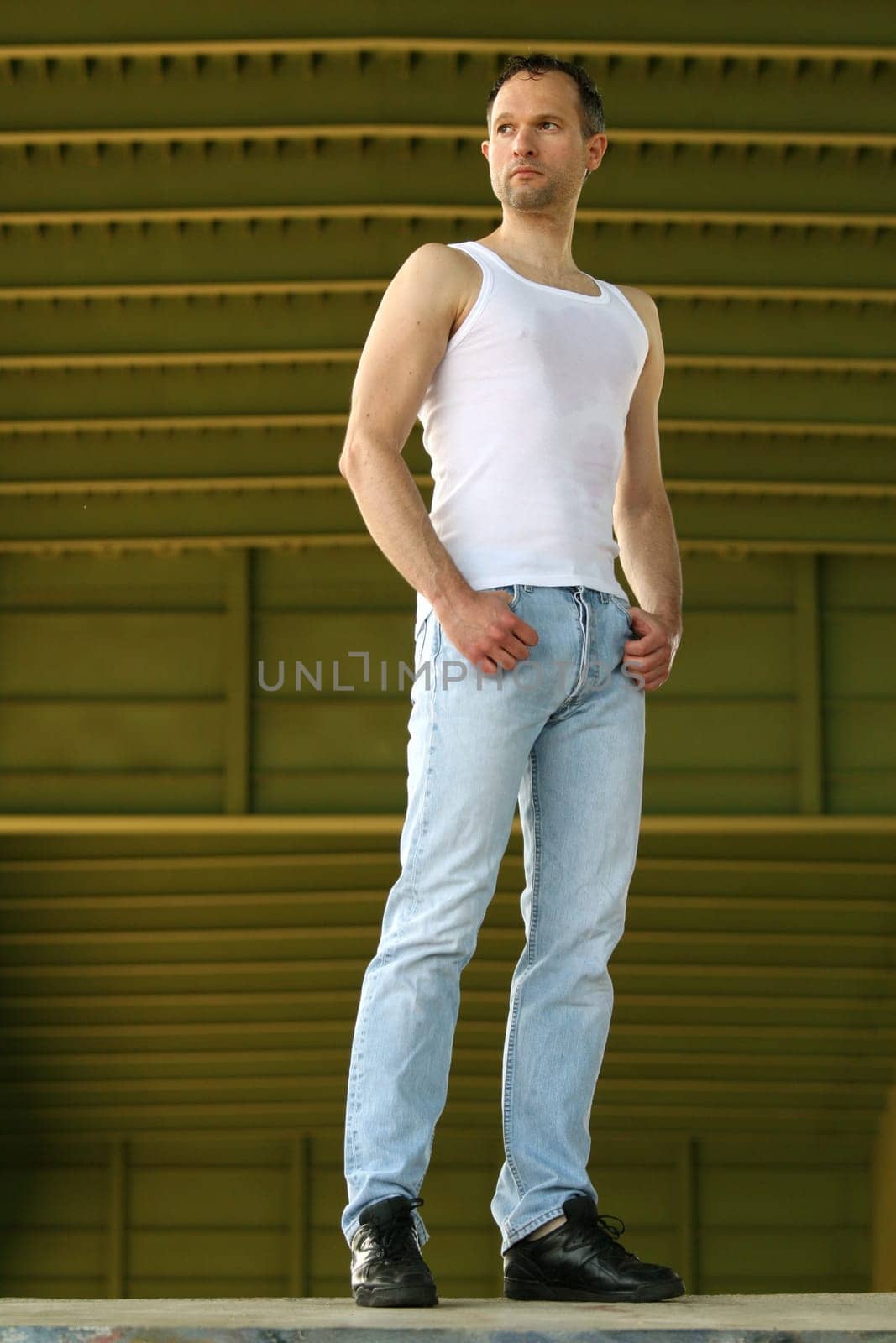 portrait of fashion man in undershirt