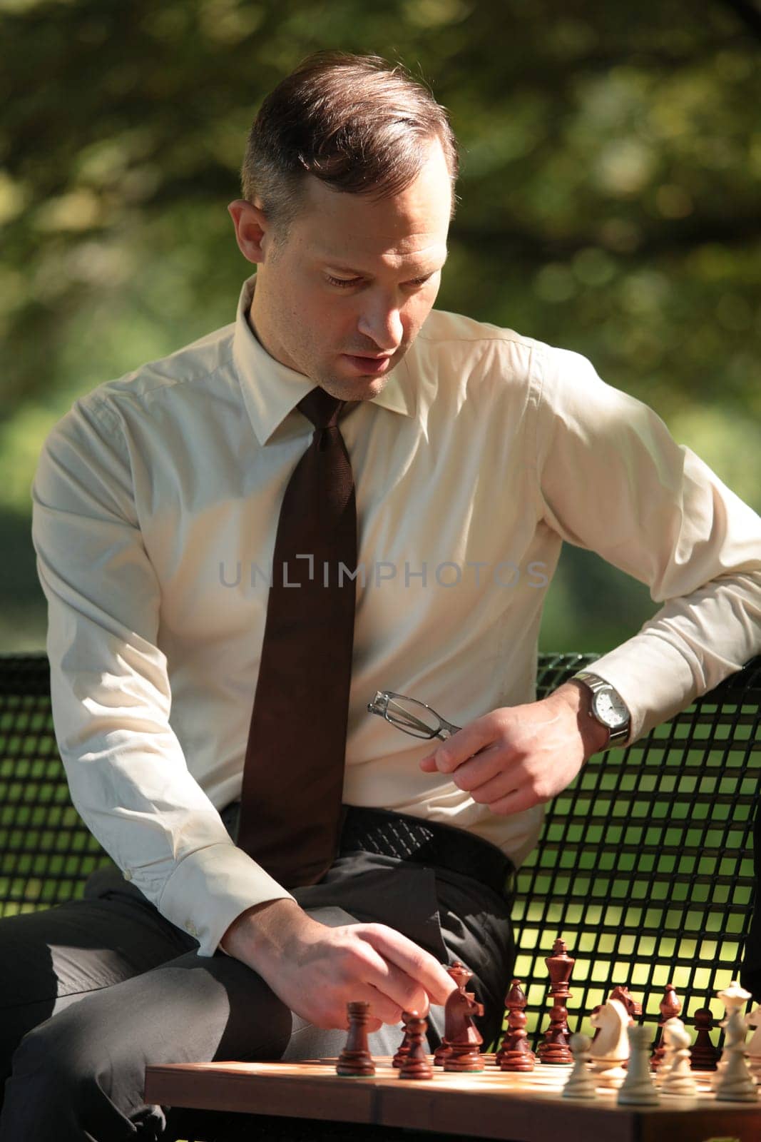 businessman playing chess game