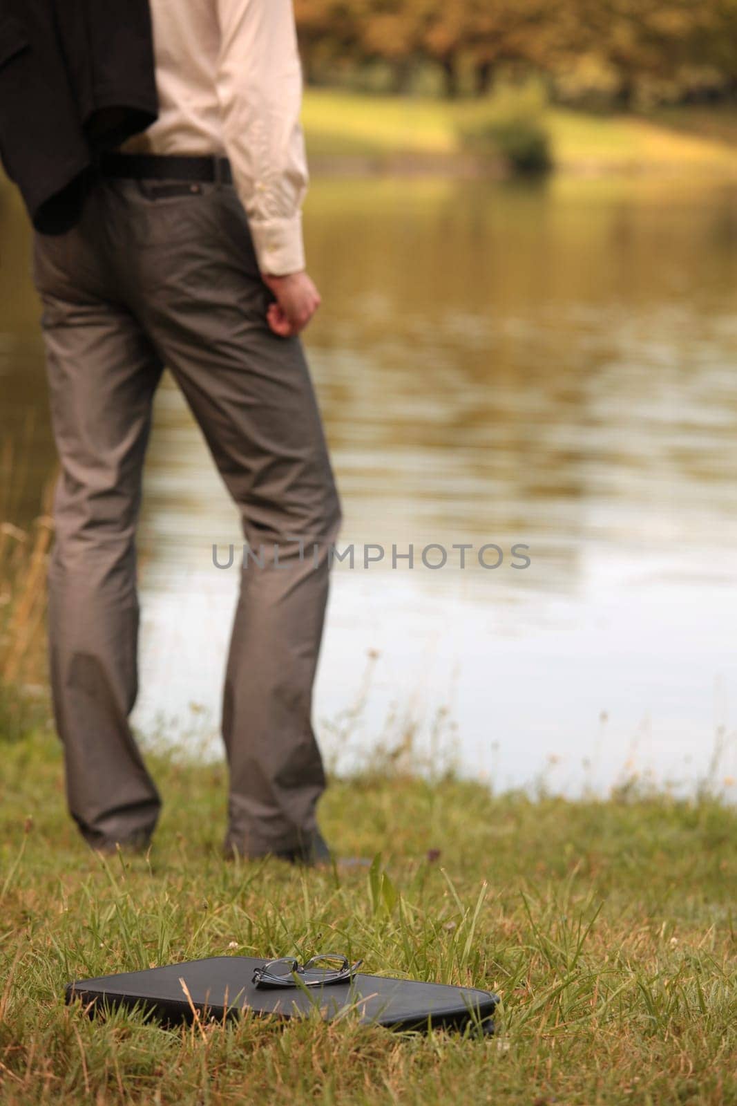 Businessman at the shore