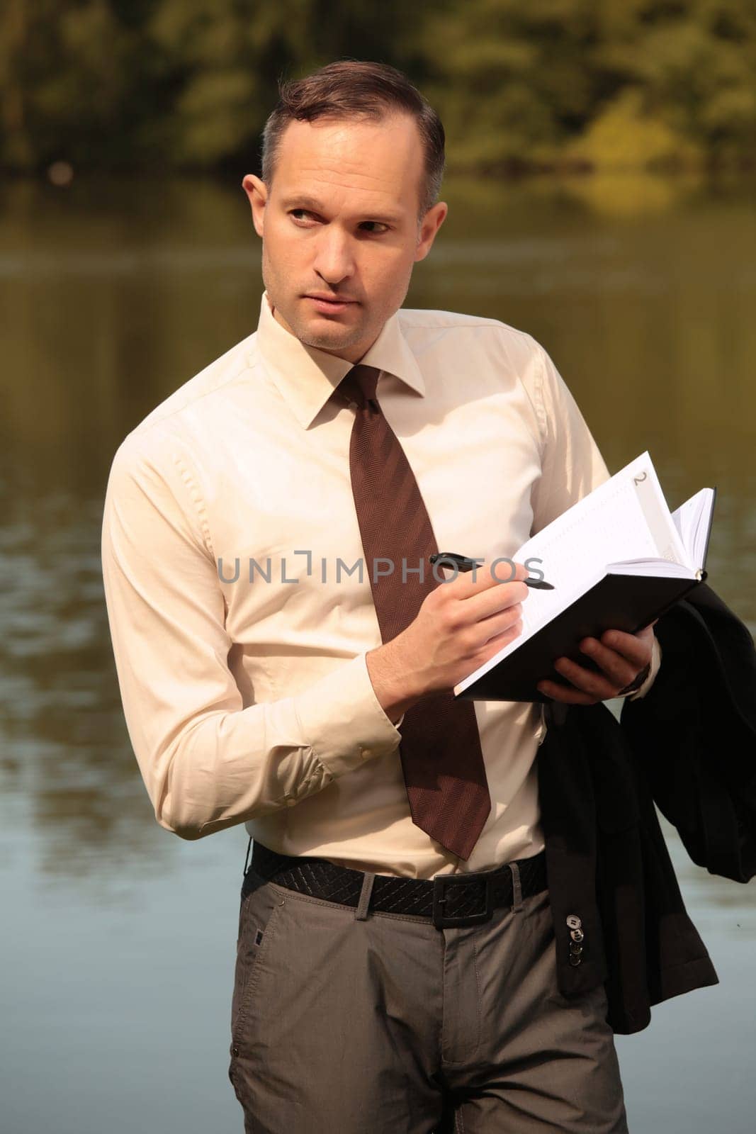 businessman making notes