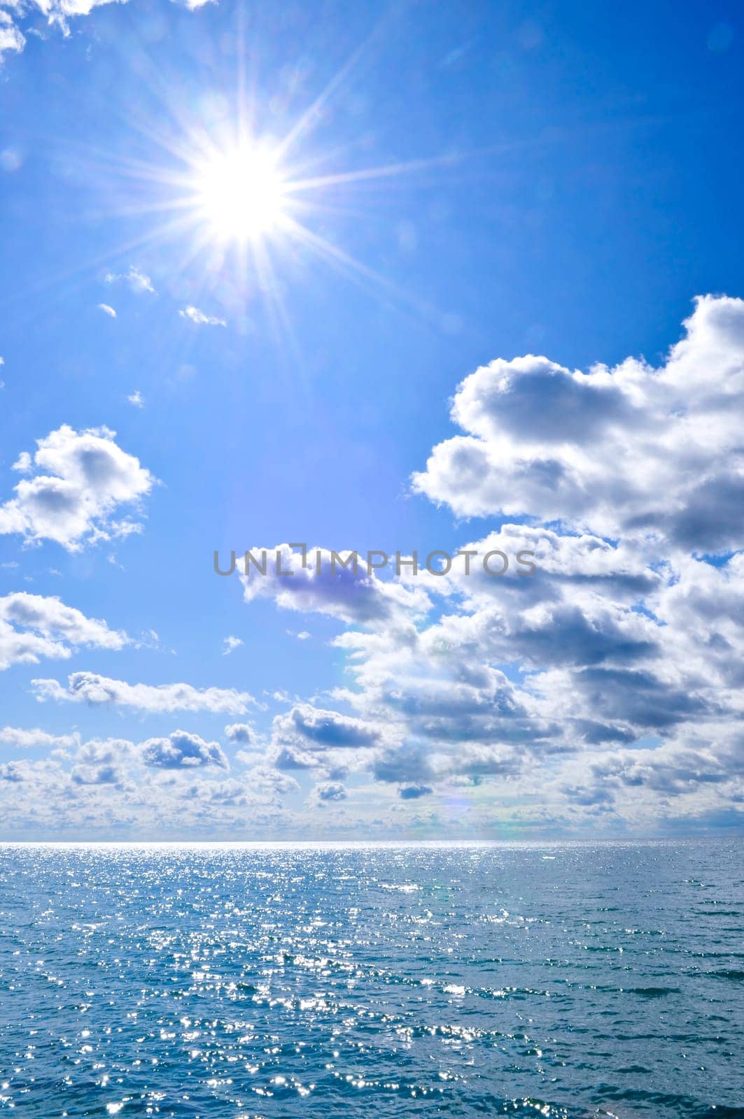 Blue water and sunny sky background