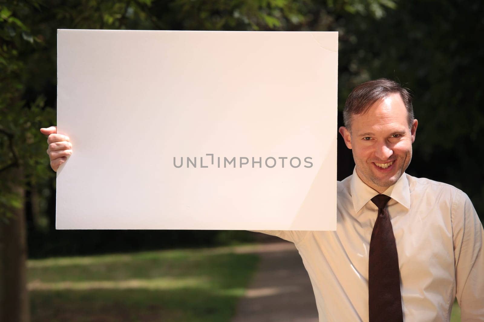 businessman with empty board