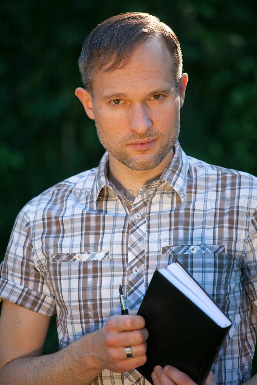 man with diary