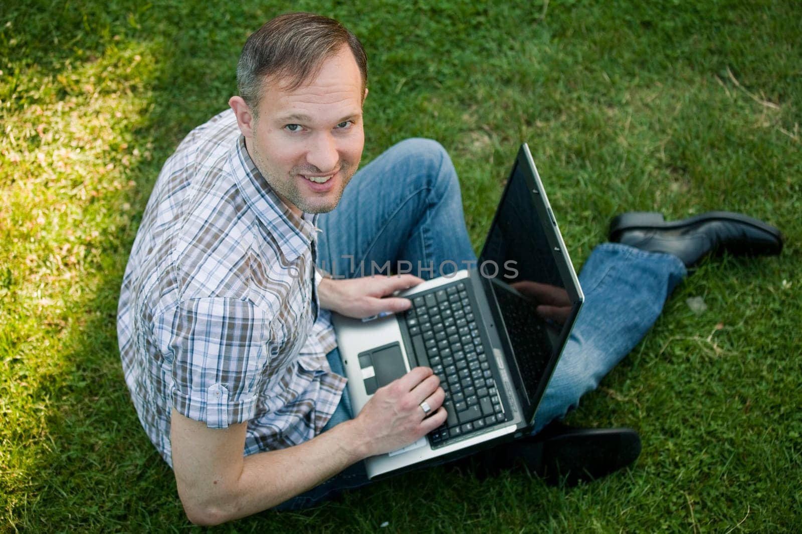 man with laptop outdoor
