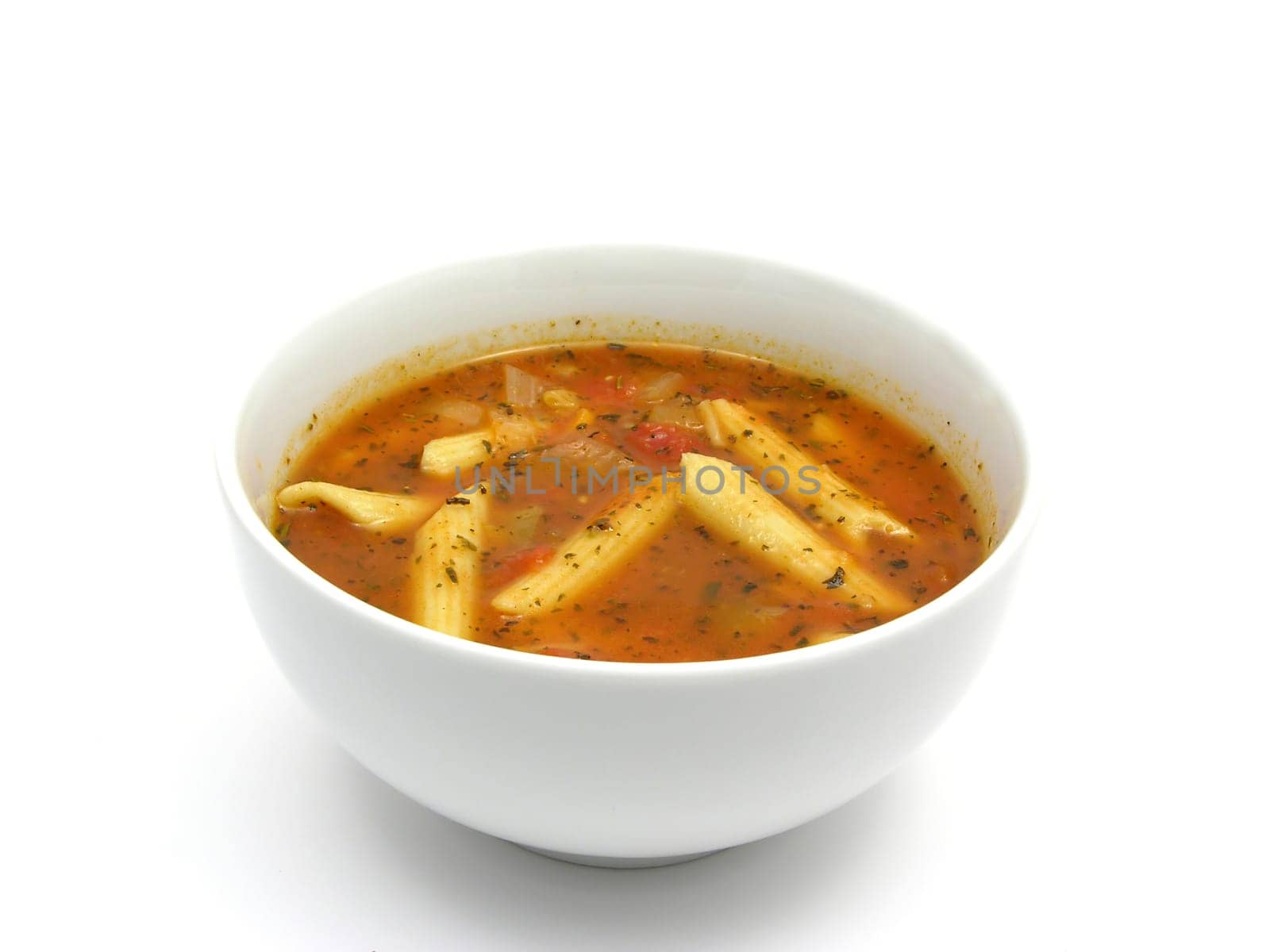 Noodle soup with tomatoes and herbs