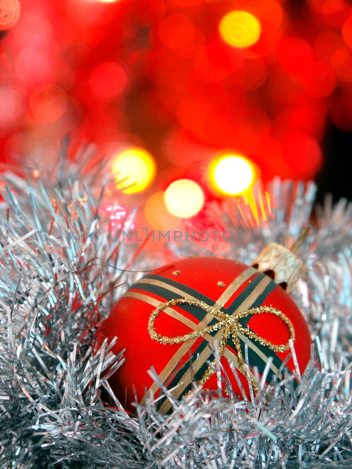 Christmas decoration - red ball with abstract background