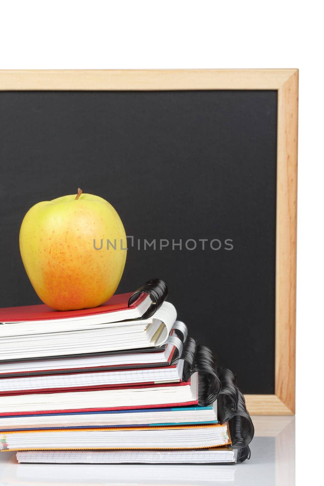 Some notebooks and apple