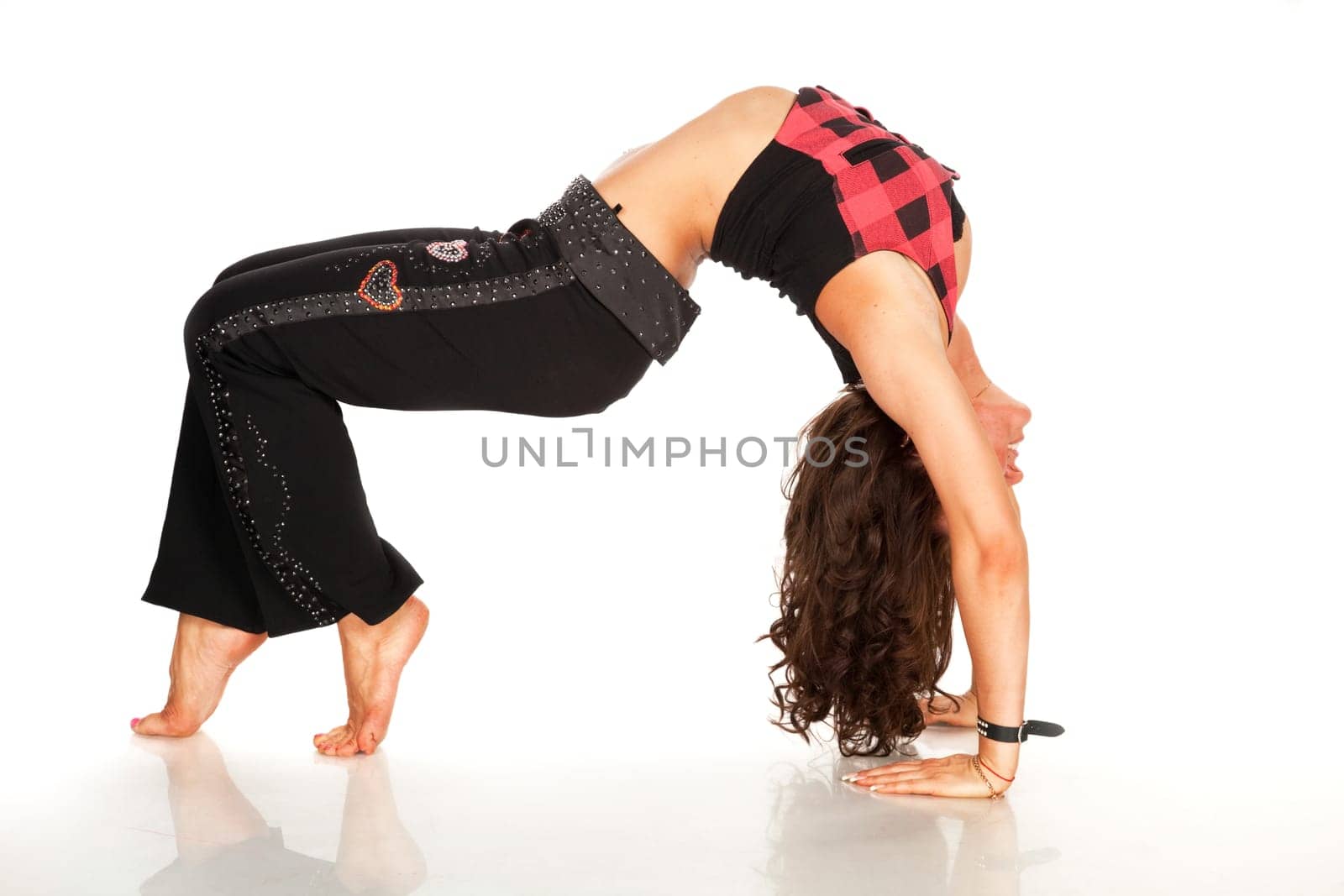 Flexible girl doing back-bend