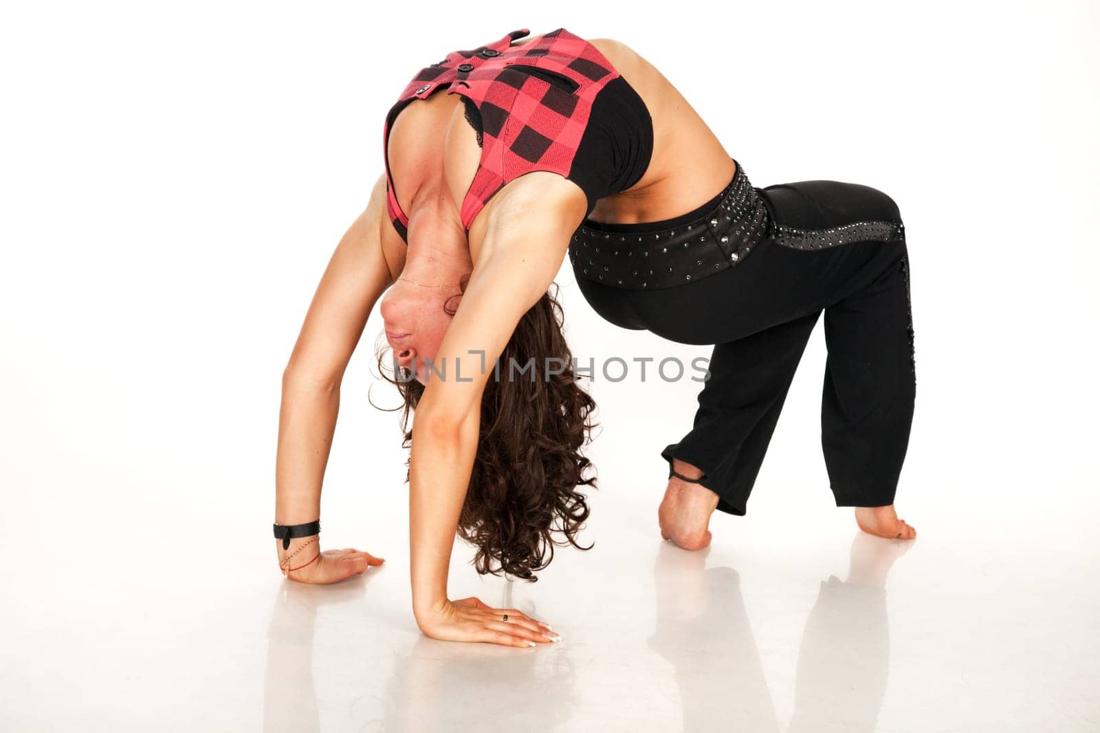 Flexible girl doing back-bend