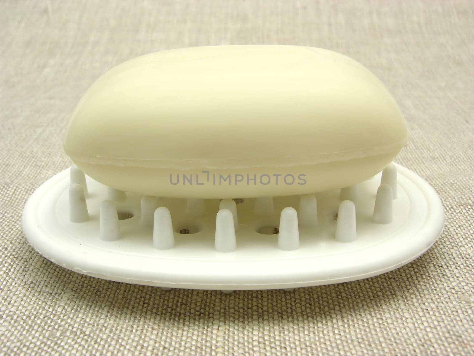 Beige soap on soap tray