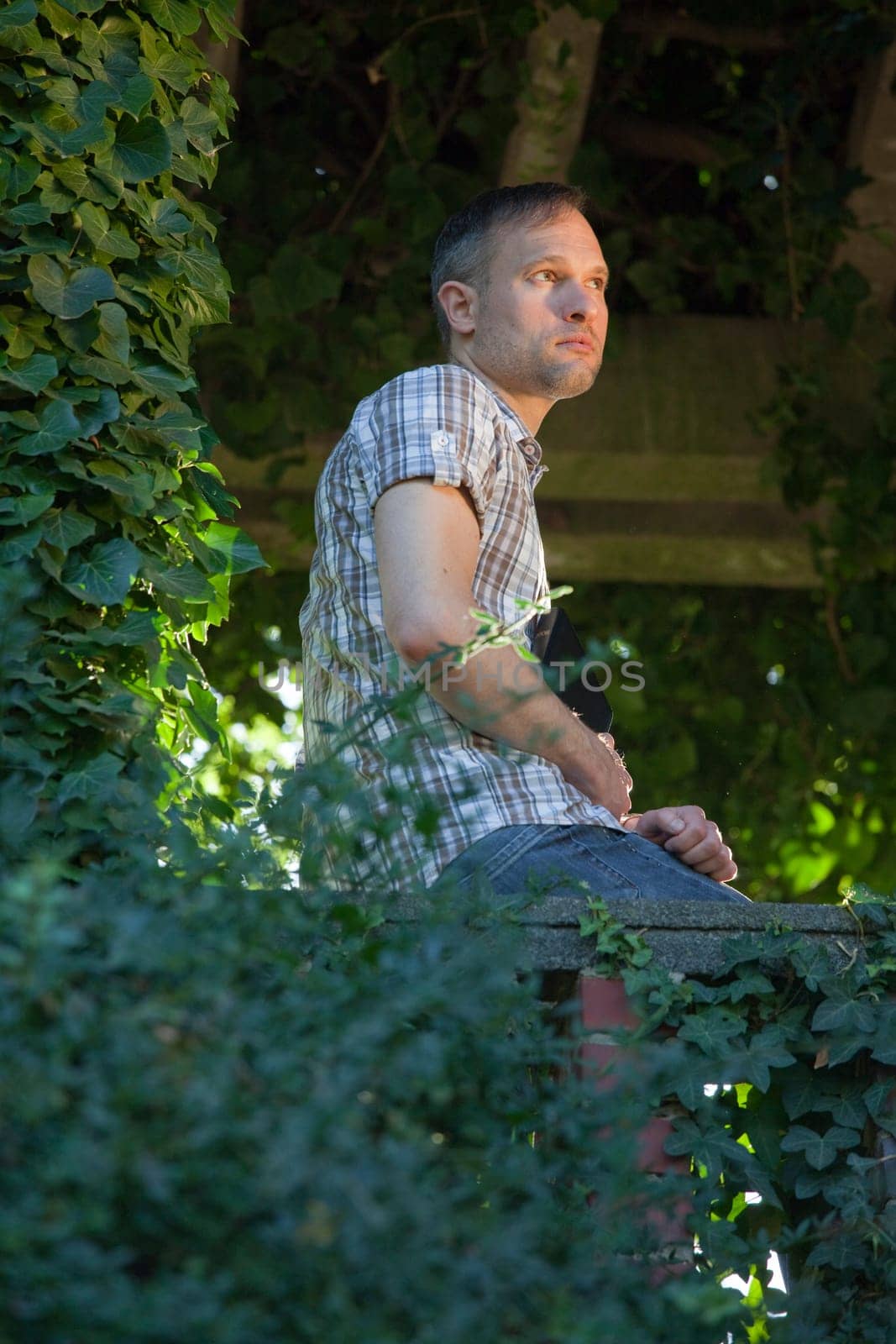 thinking man in park