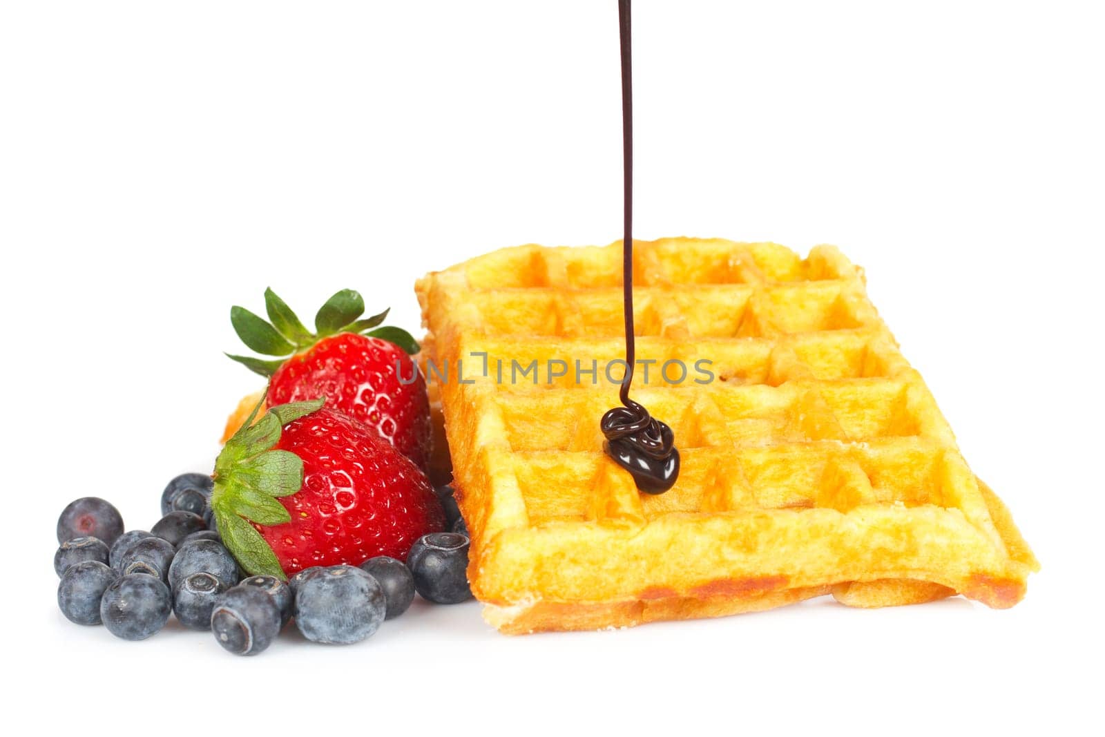 Poured syrup on waffles