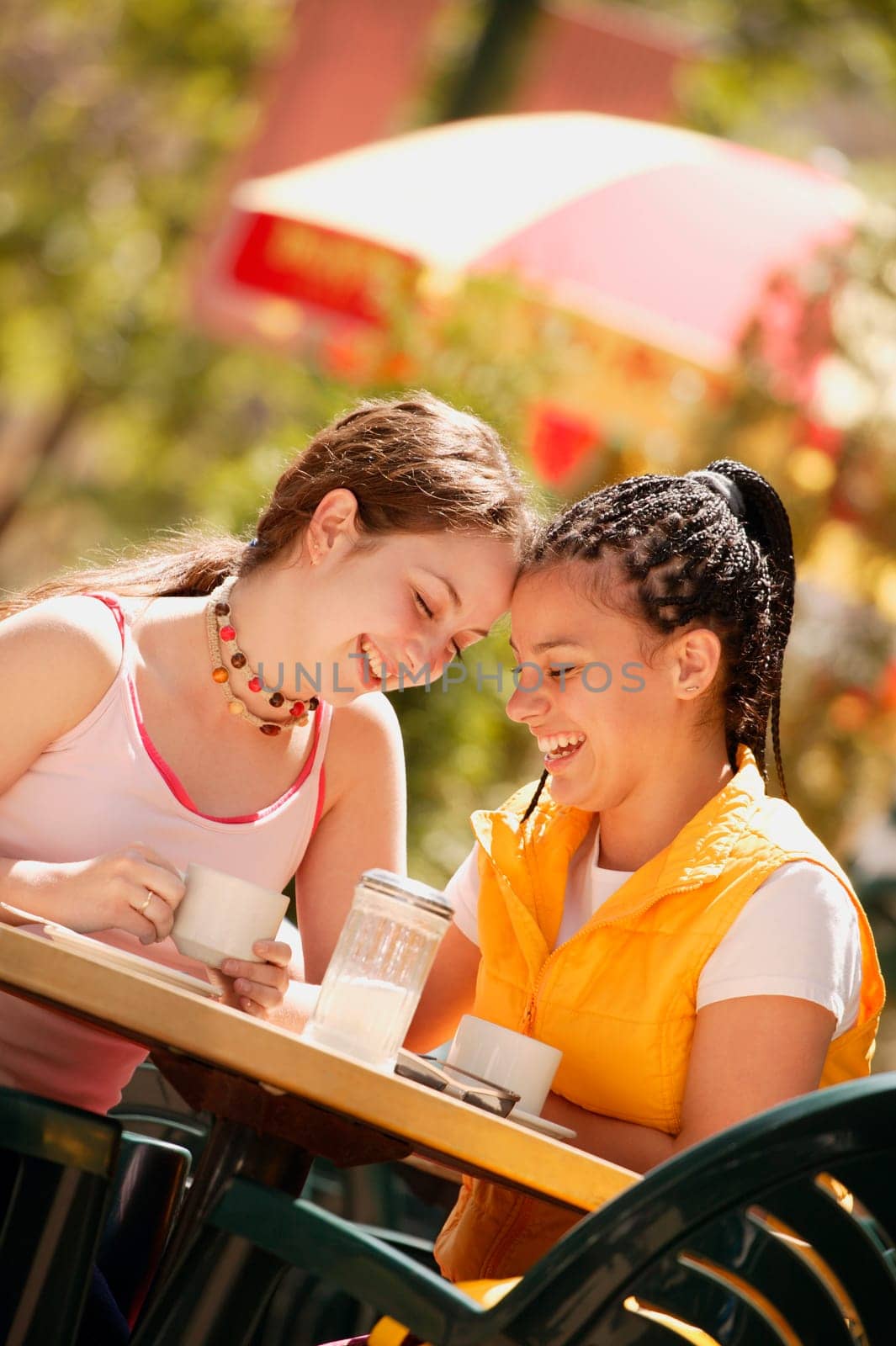 Two girls have coffee