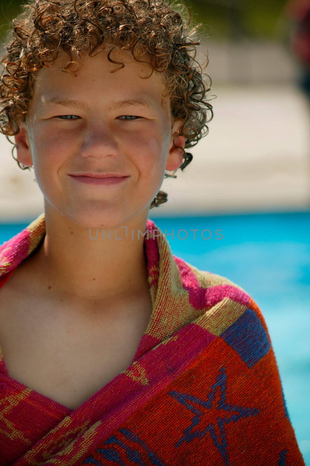 Child with a beach towel