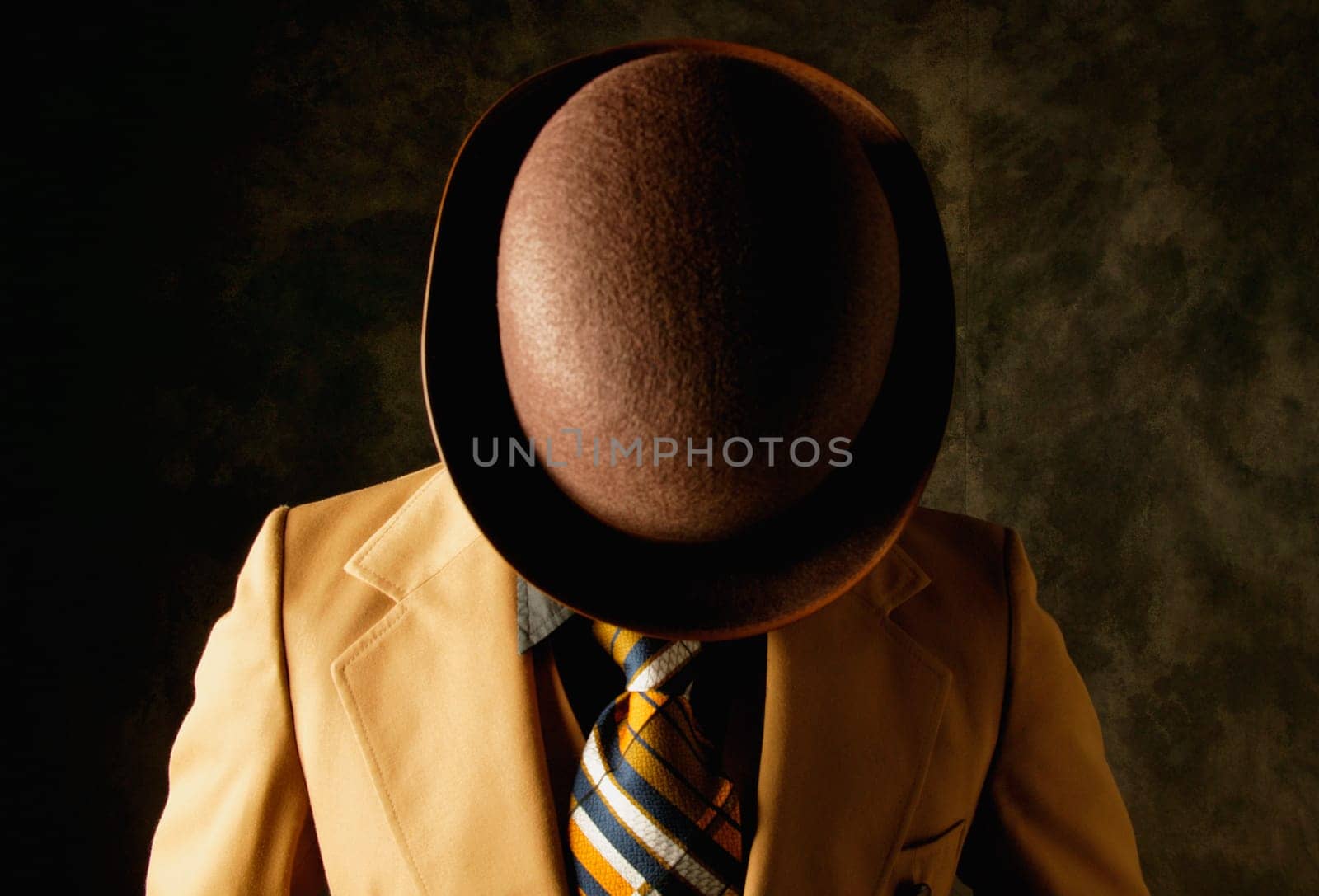 Man hides his face