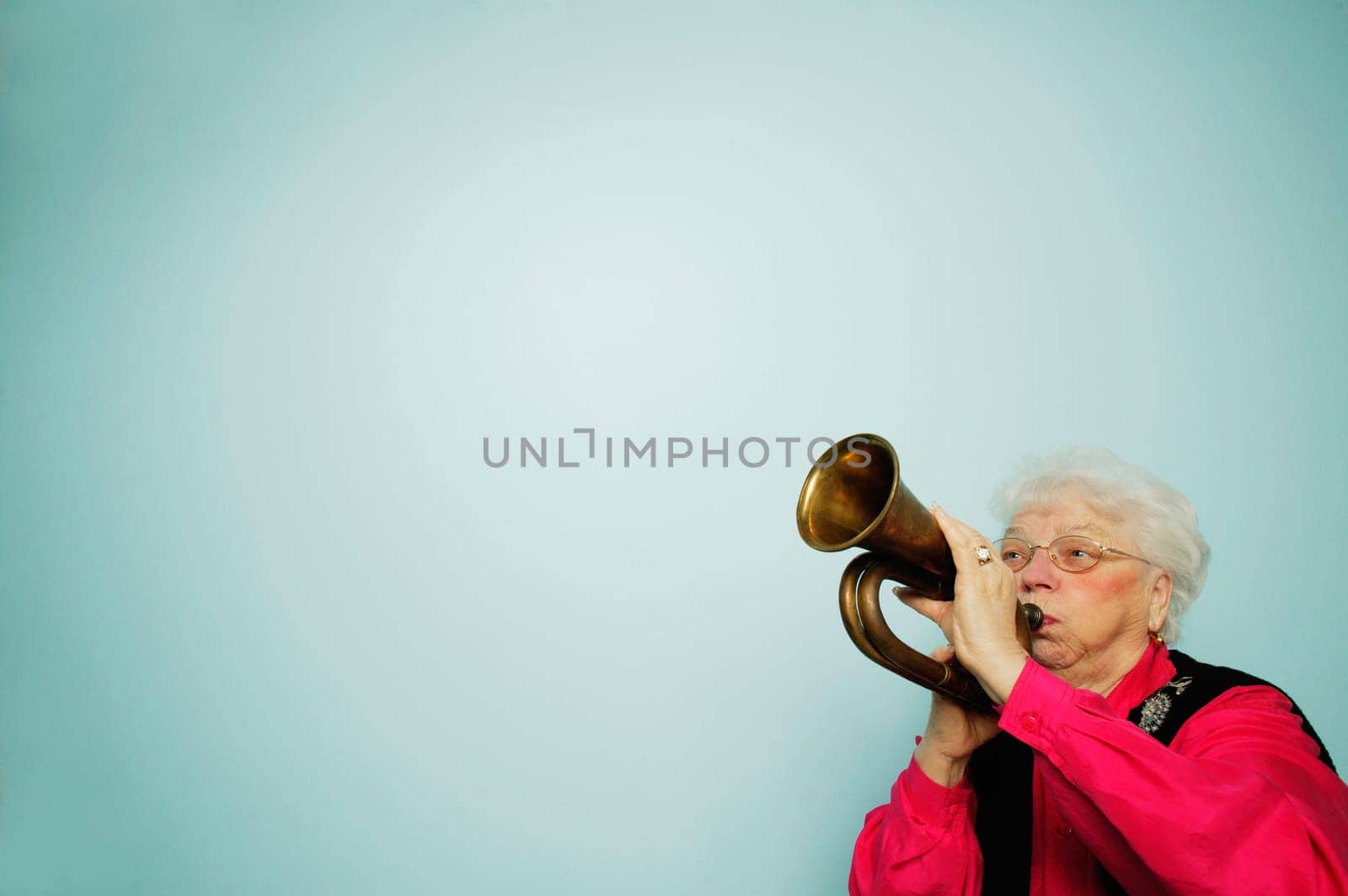Woman plays horn