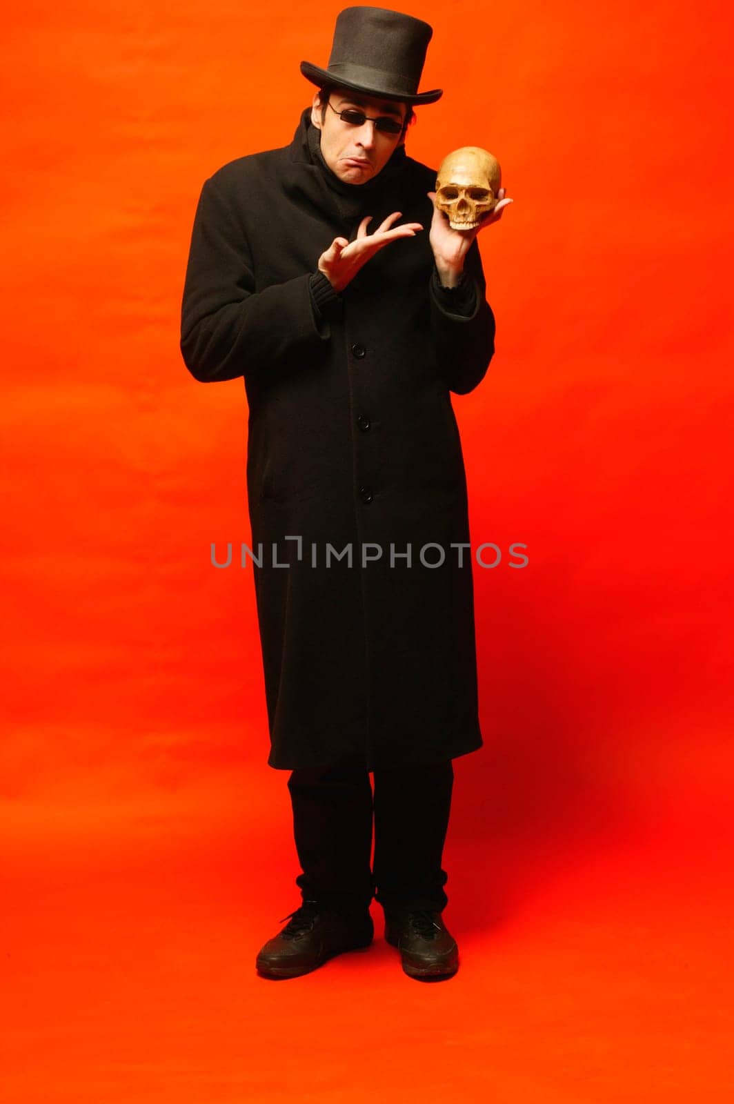 Man displays skull