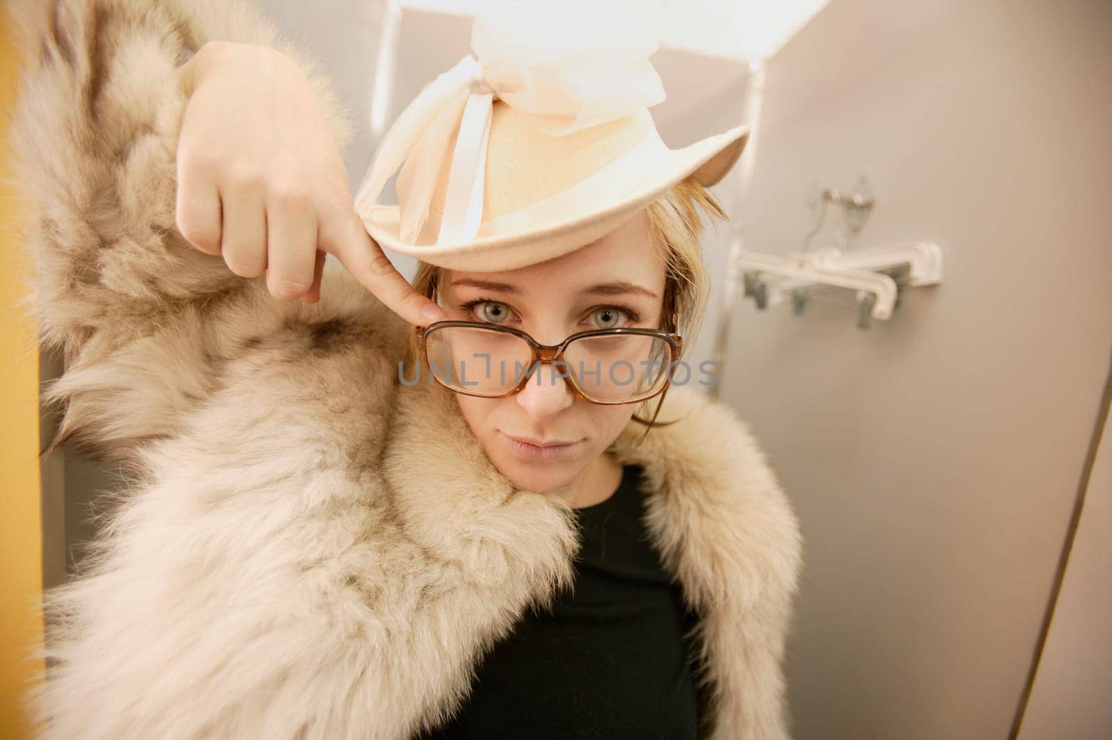 Woman tries on a fur coat