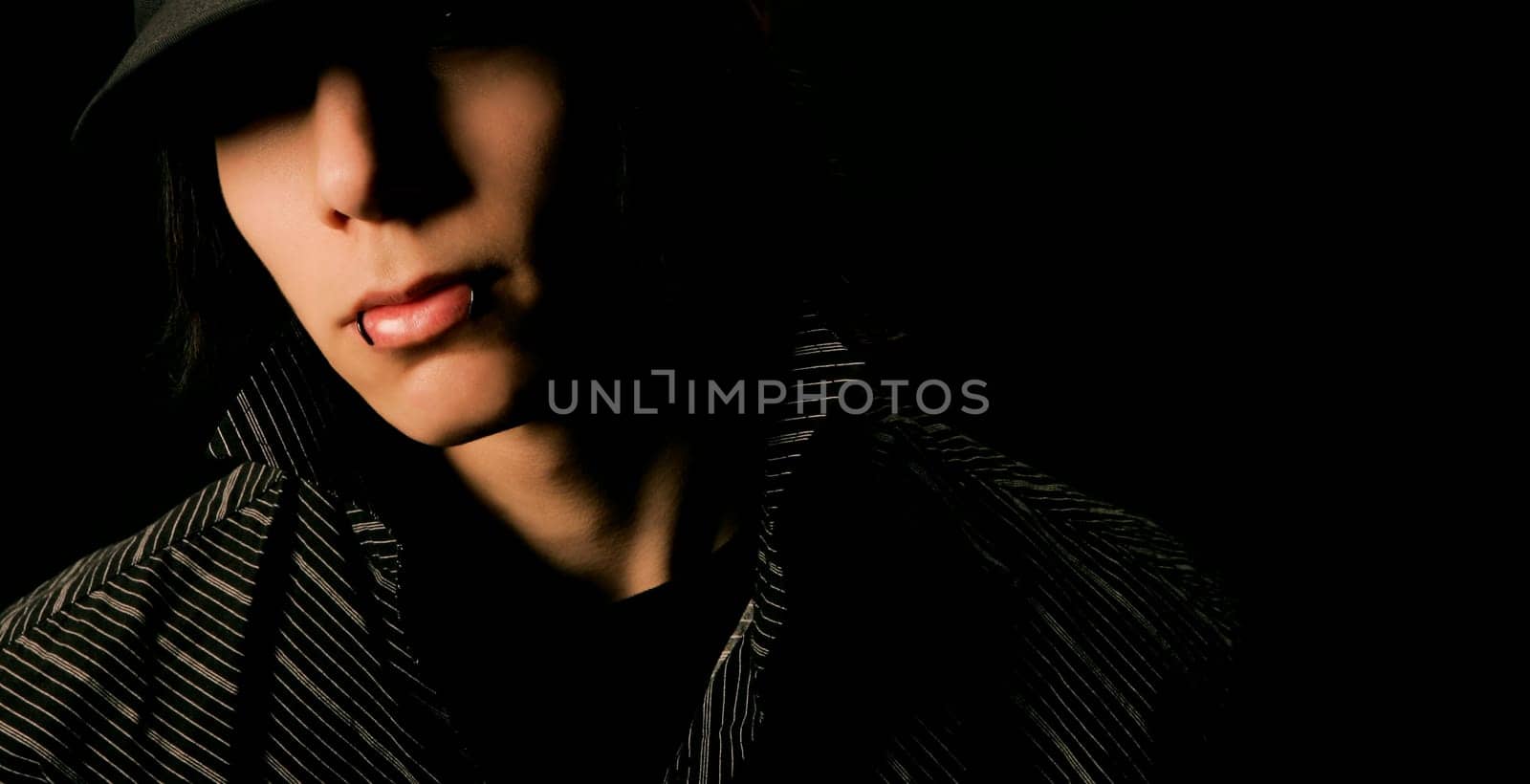 Teenager with lip piercing