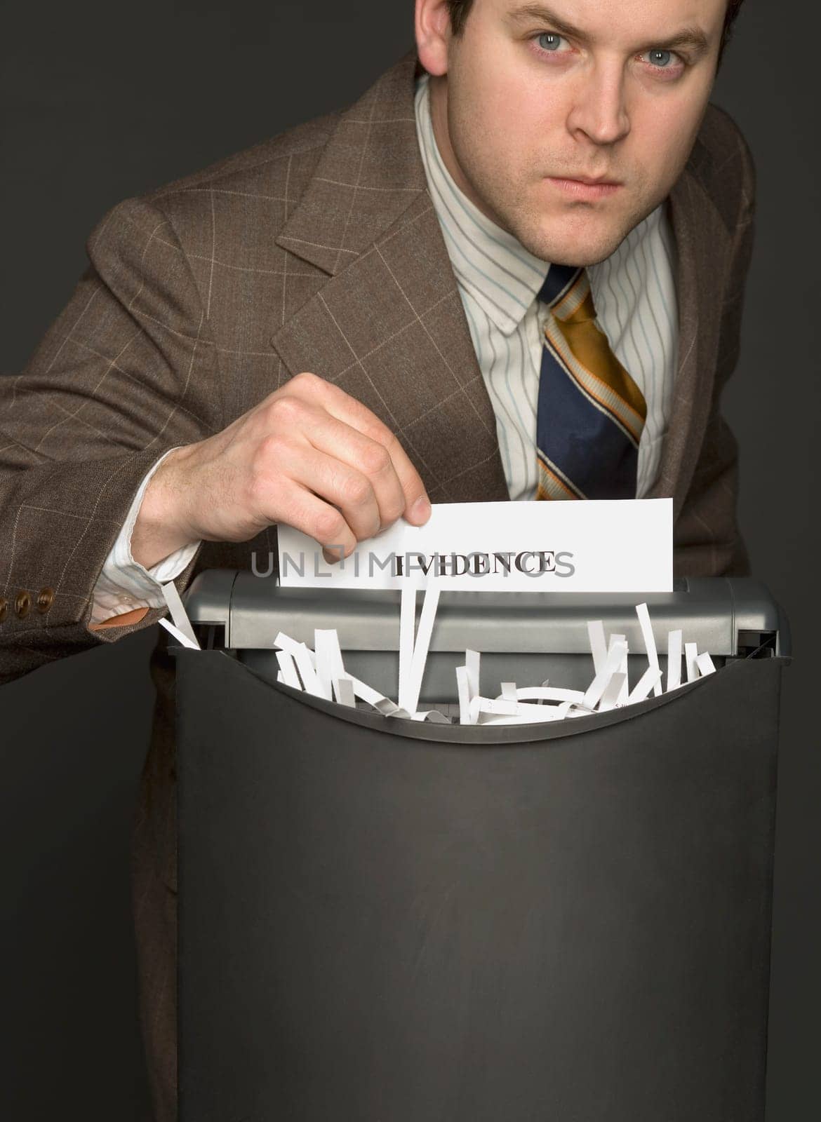 Man shredding the evidence