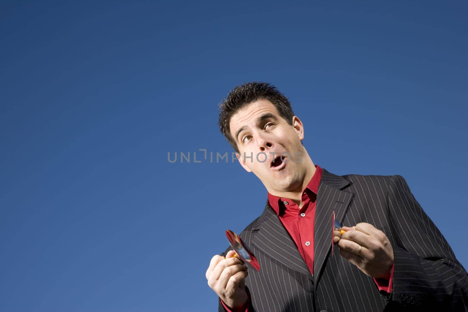 Man playing child size cymbals