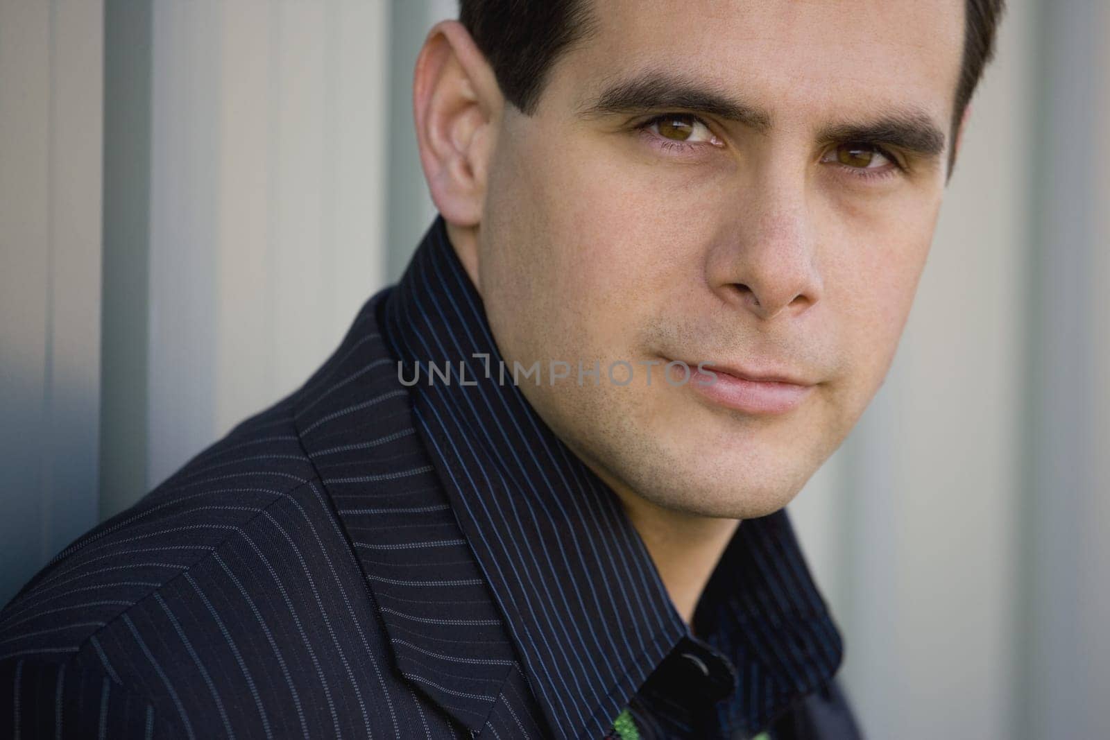 Man in pinstriped clothing