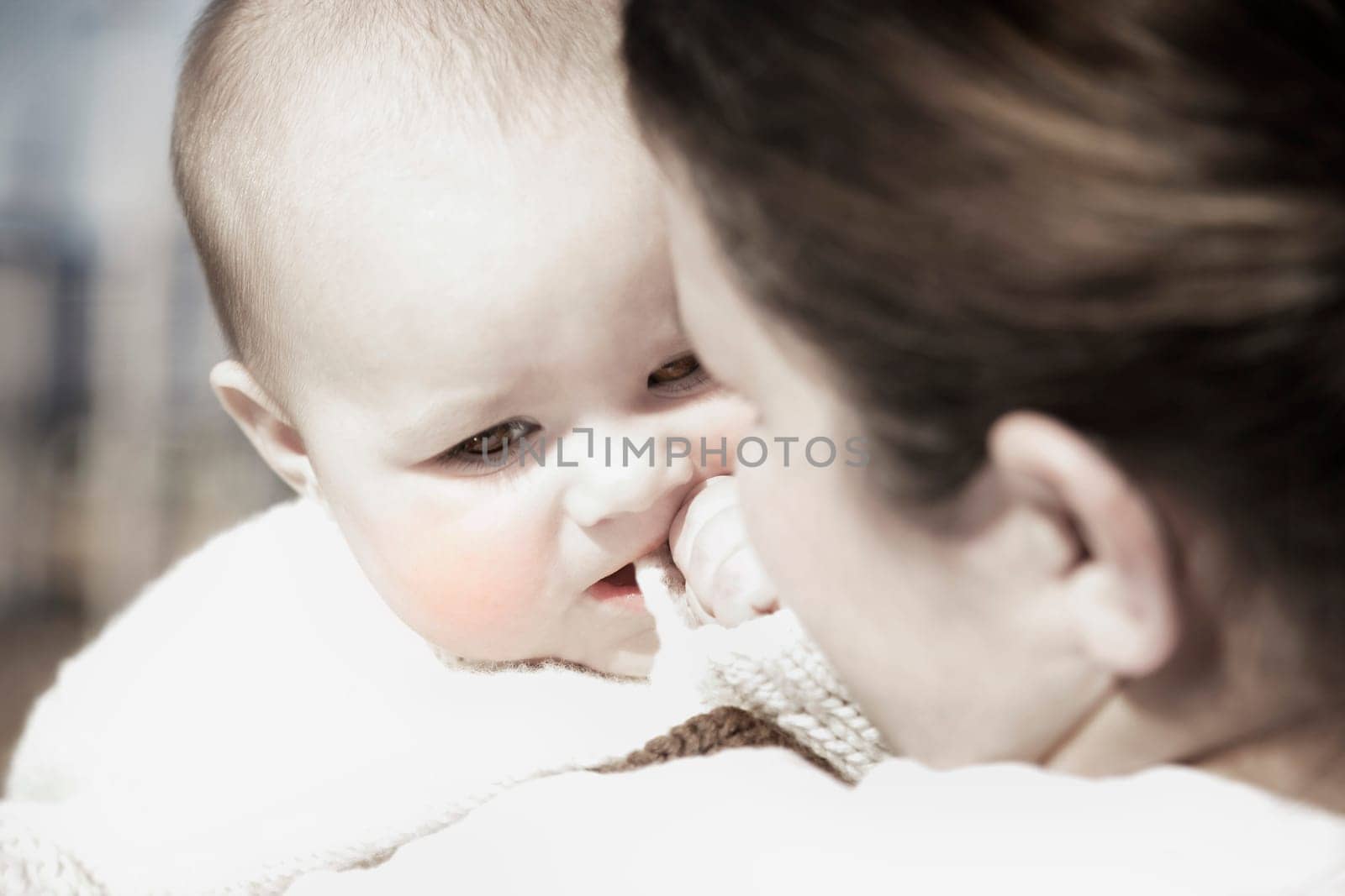 Baby on mother's shoulder