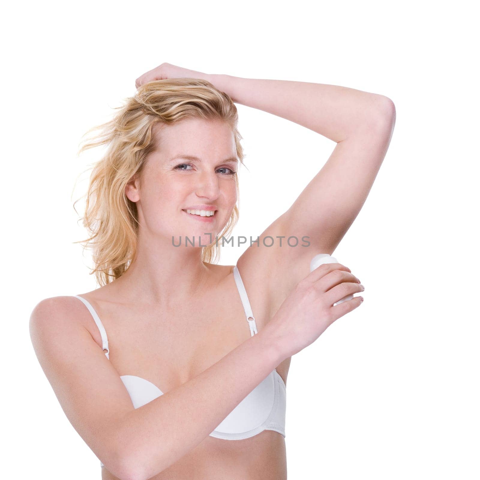 Young woman with deodorant roller