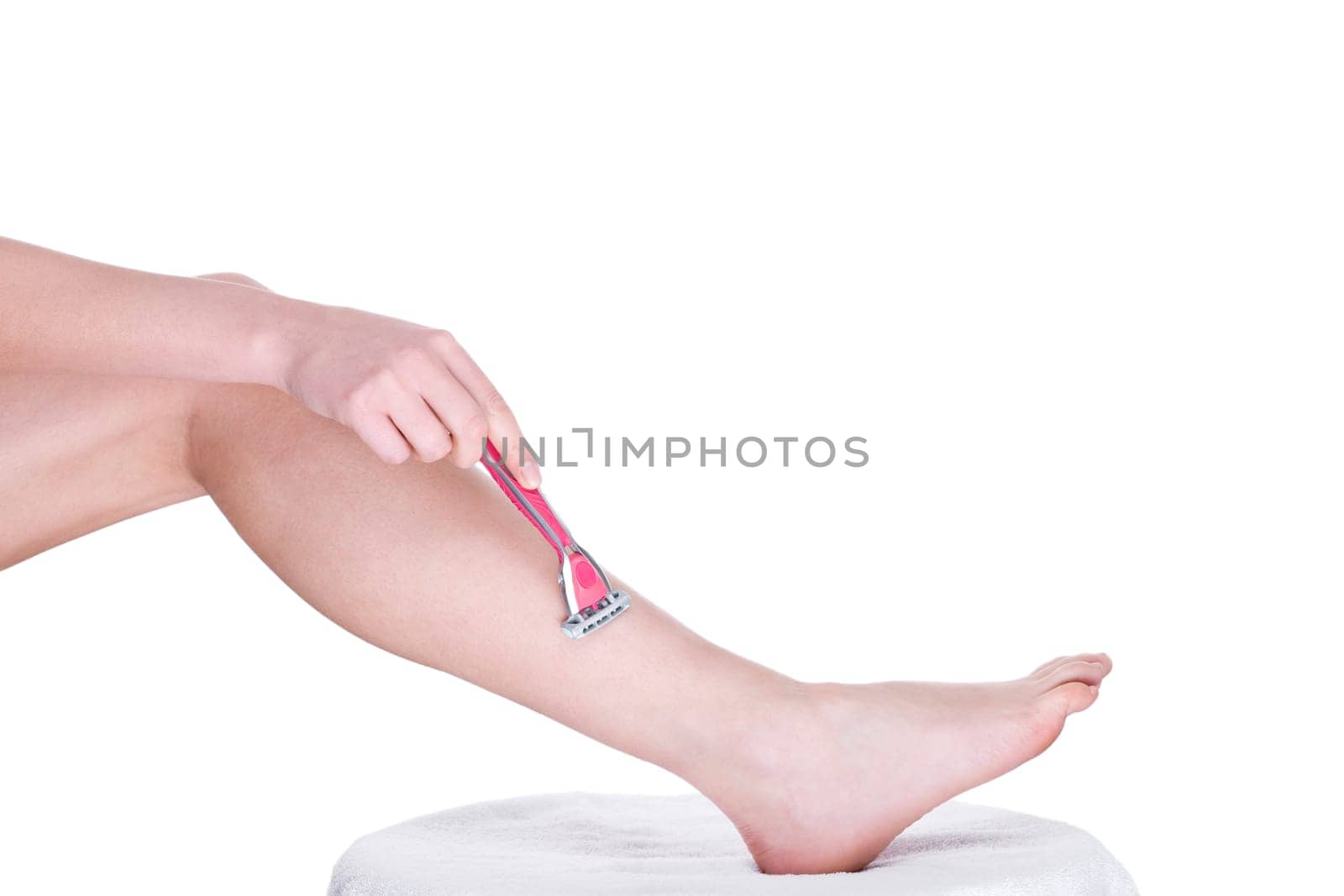 Young woman with razor