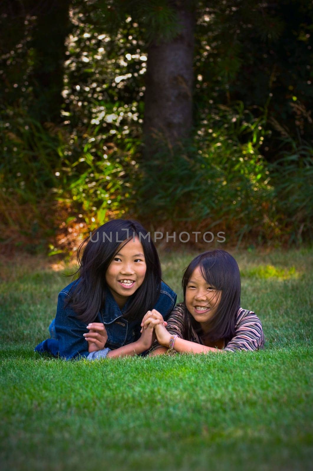 Sisters holding hands