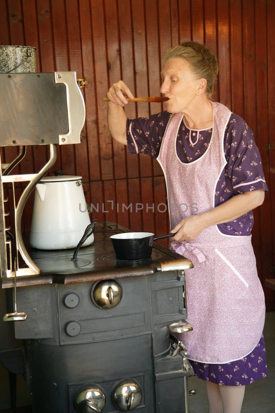 A woman sampling food