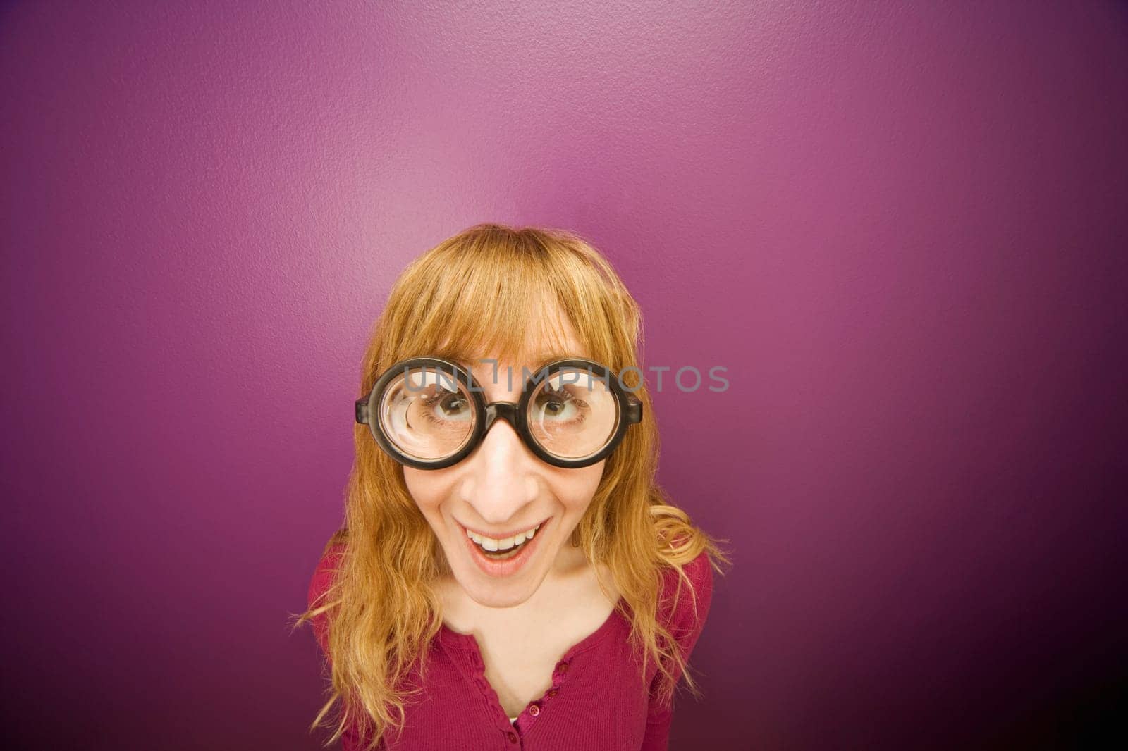 Woman wearing prop eyeglasses