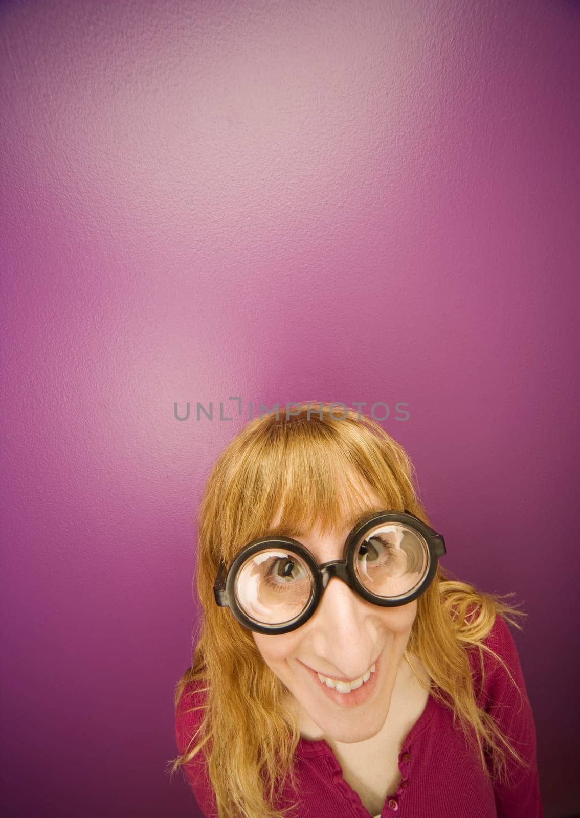 Woman wearing prop eyeglasses