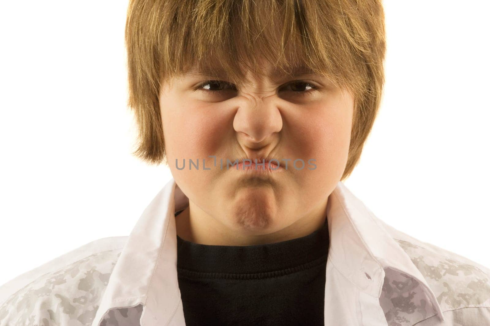 Young boy making silly face