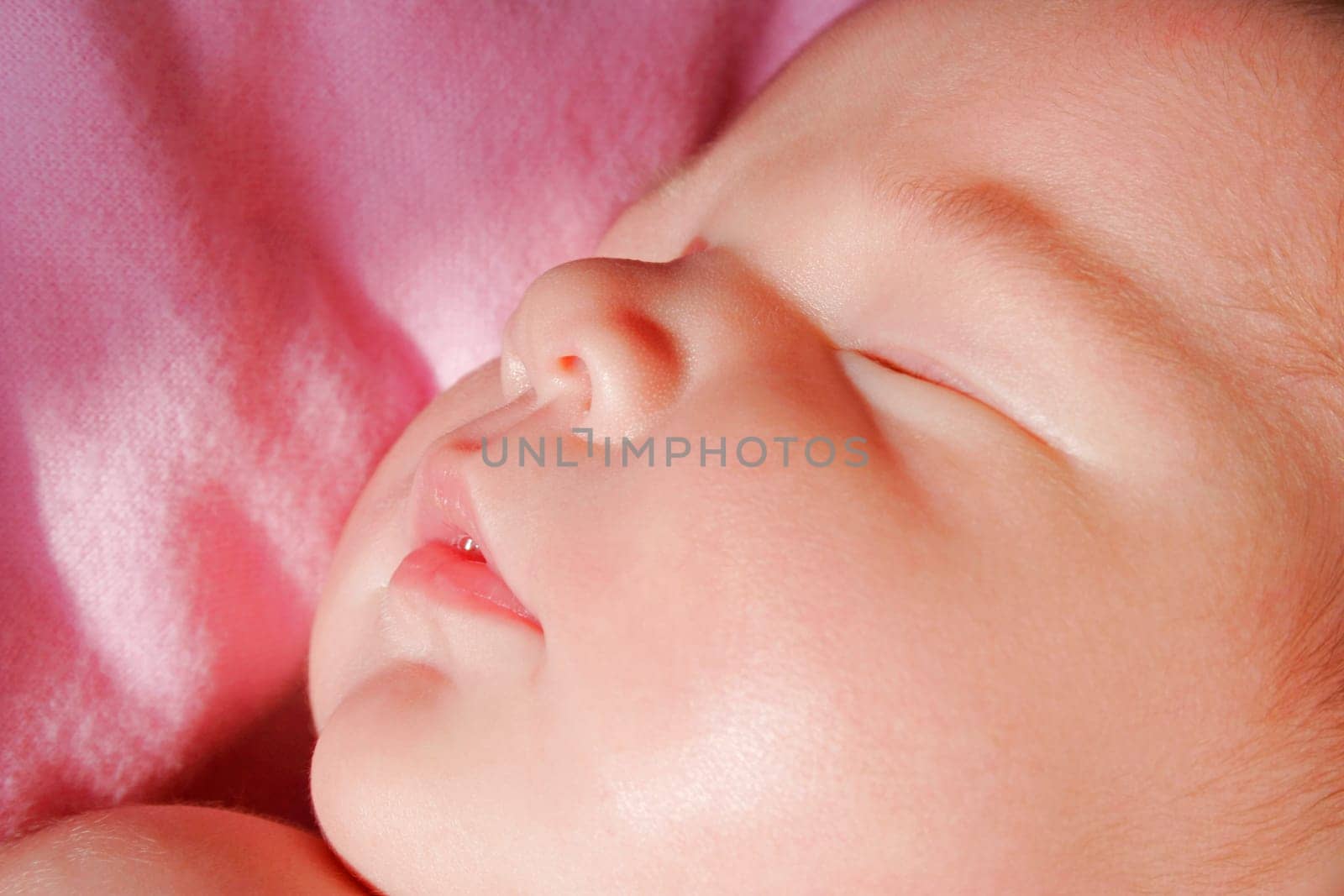 The face of a sleeping baby