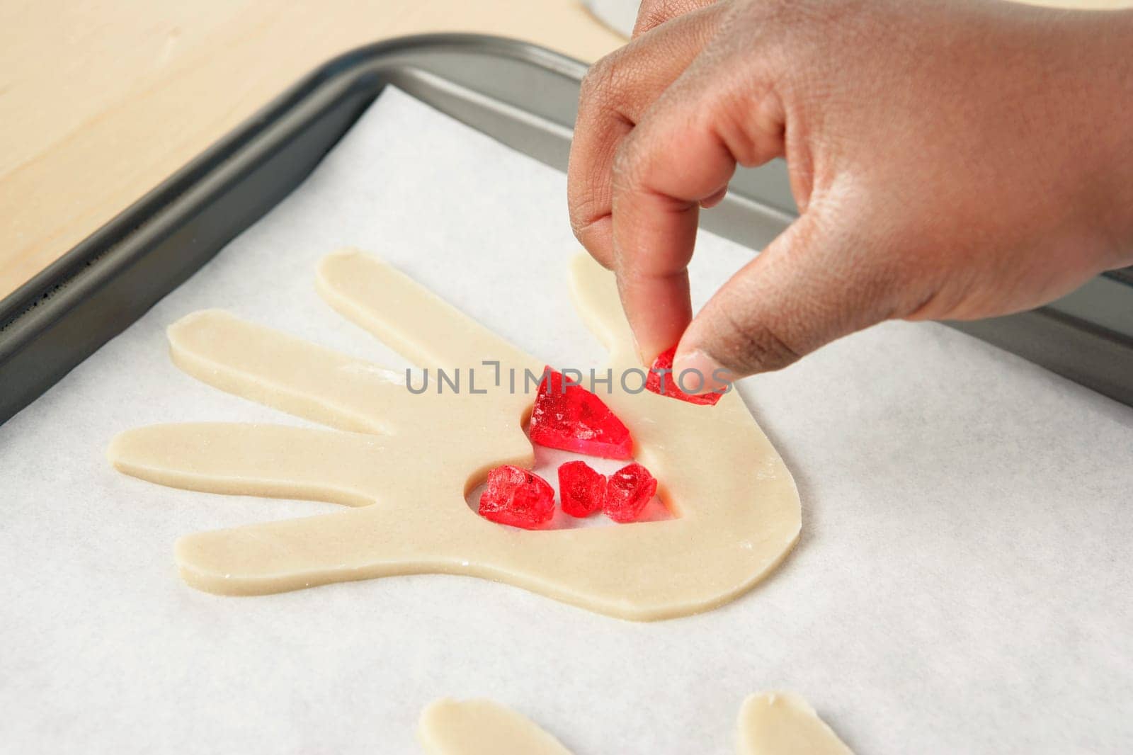 Person garnishing food