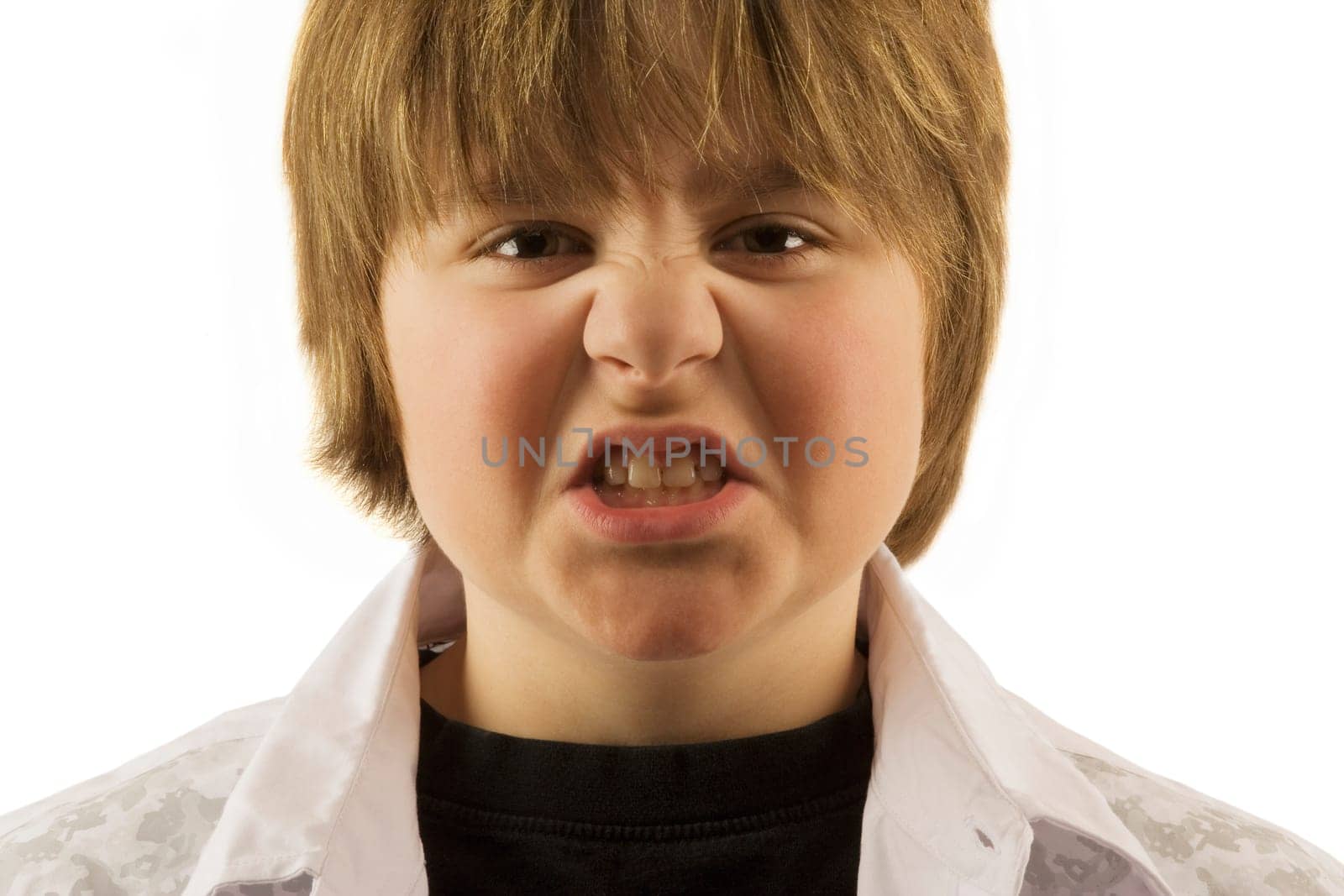 Young boy making silly face