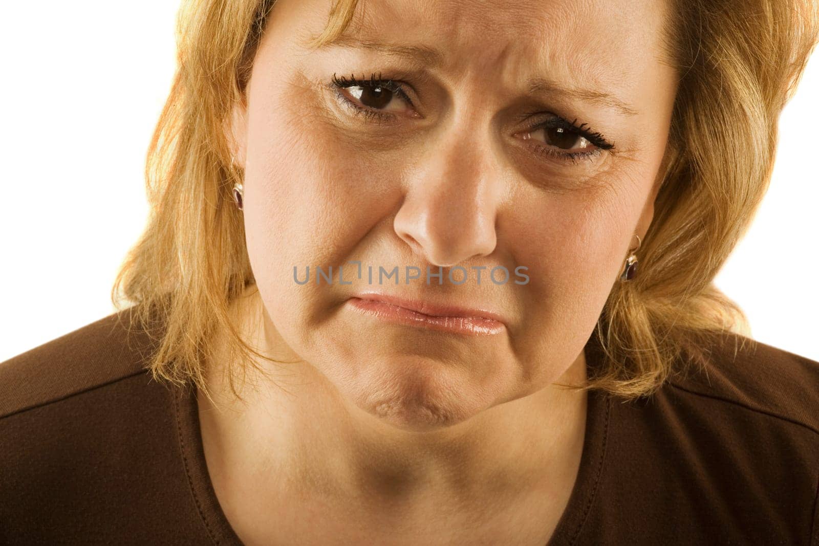 Middle aged woman looking sad