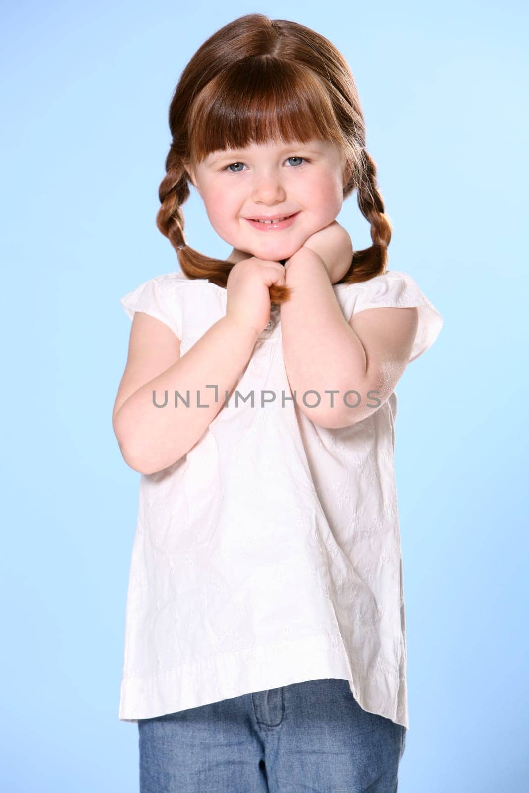 Portrait of little girl with braids