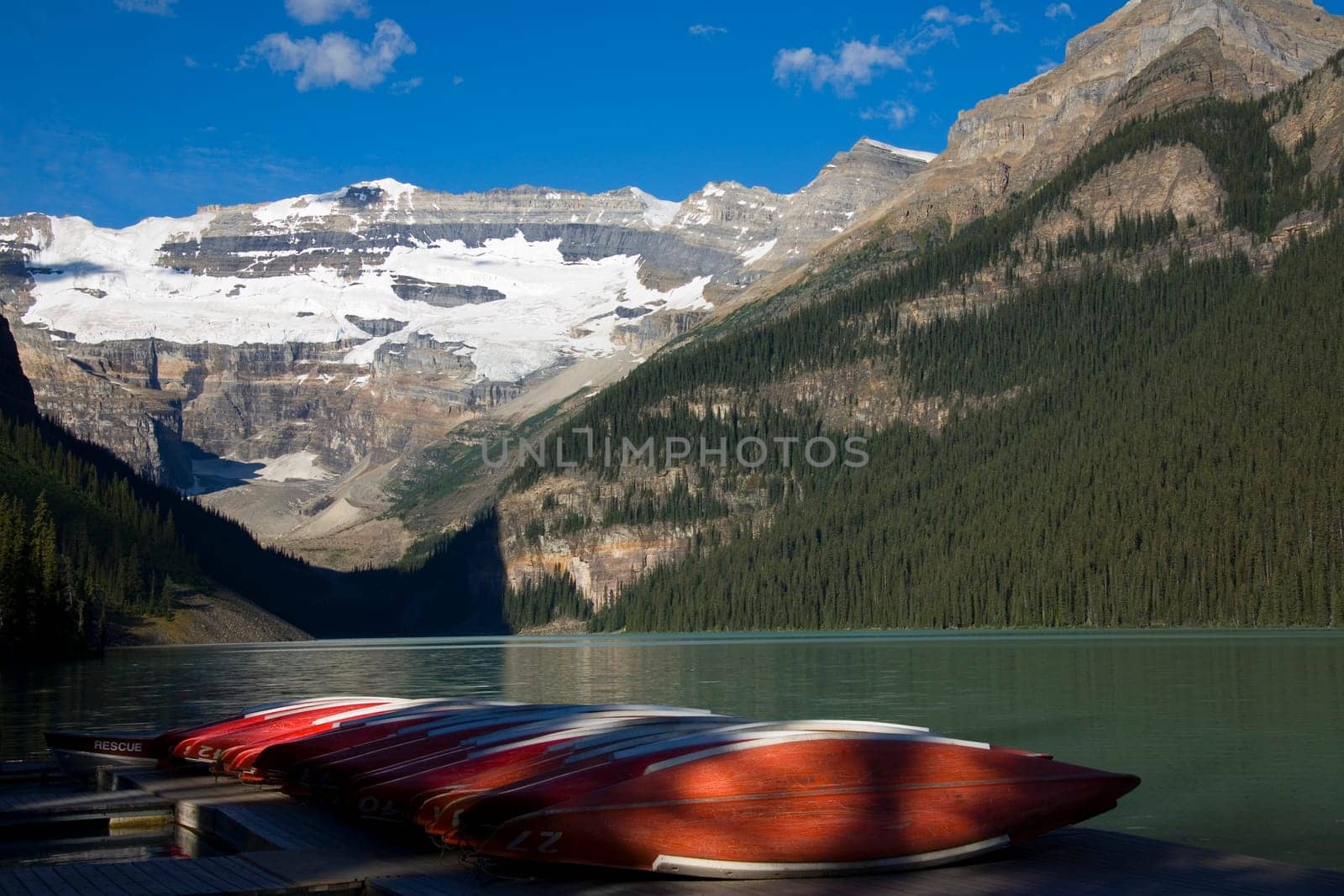 Canoes on dock at Lake Louise in Banff National Park, Alberta, Canada