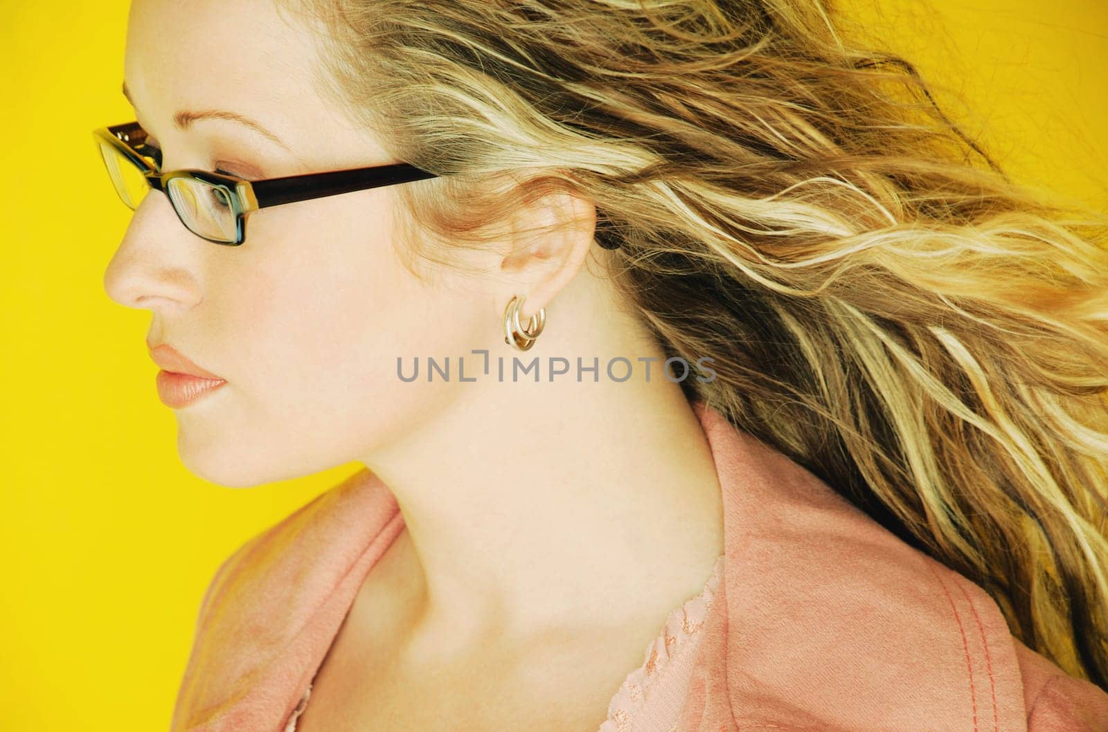 Model wearing trendy glasses