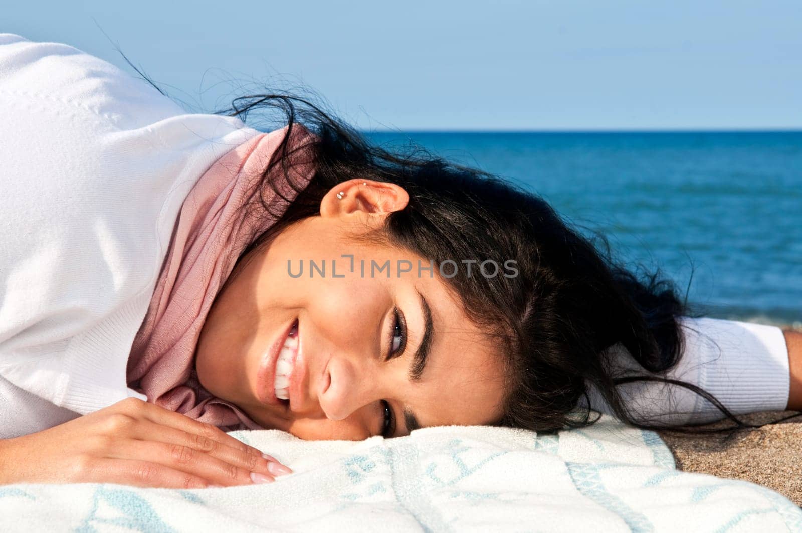 Young native american woman at beach