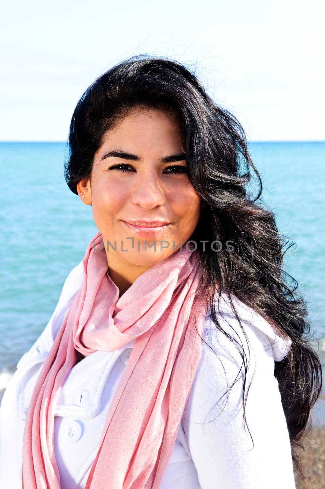 Beautiful young woman at beach