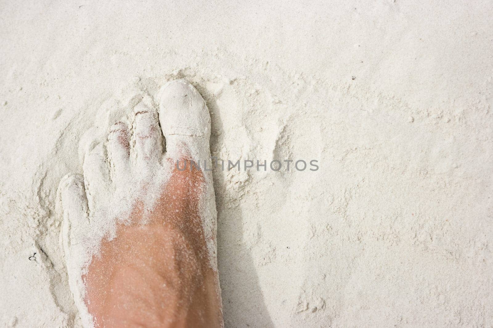 Feet in sand