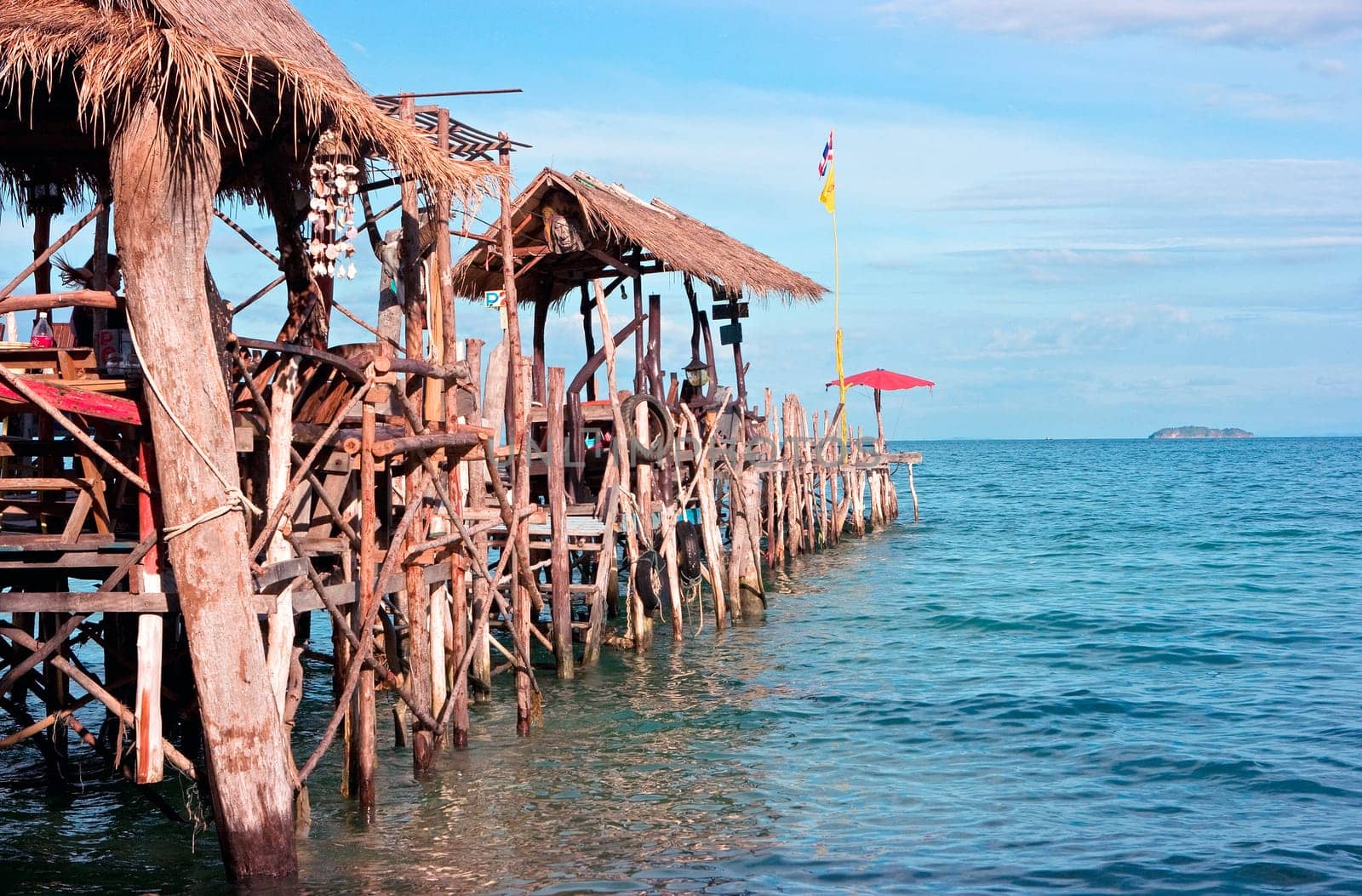 Wood old pier with huts