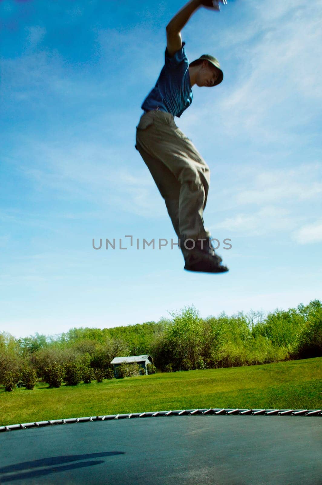 Jumping on a trampoline