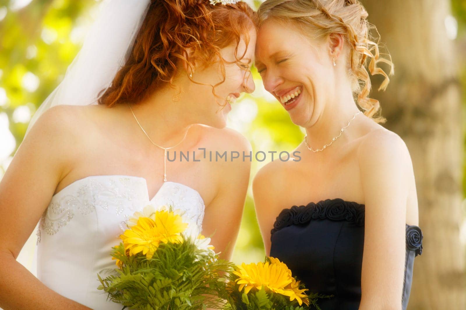 Bride and bridesmaid share memories
